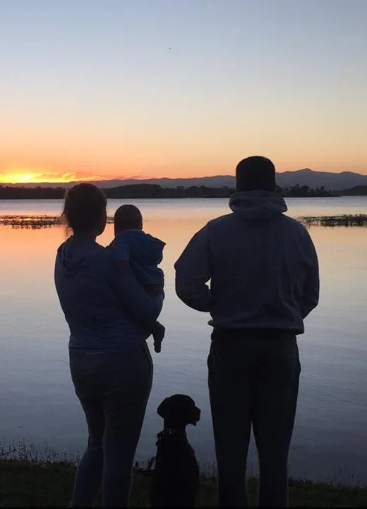 Luke Bayly Family Life with a portrait of family looking over Eungella Dam in Mackay QLD